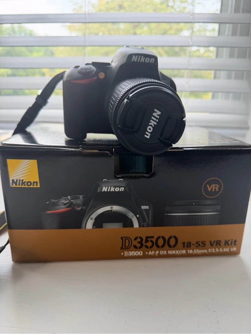 Nikon D3500 DSLR Camera Kit in Black with Orange Accent